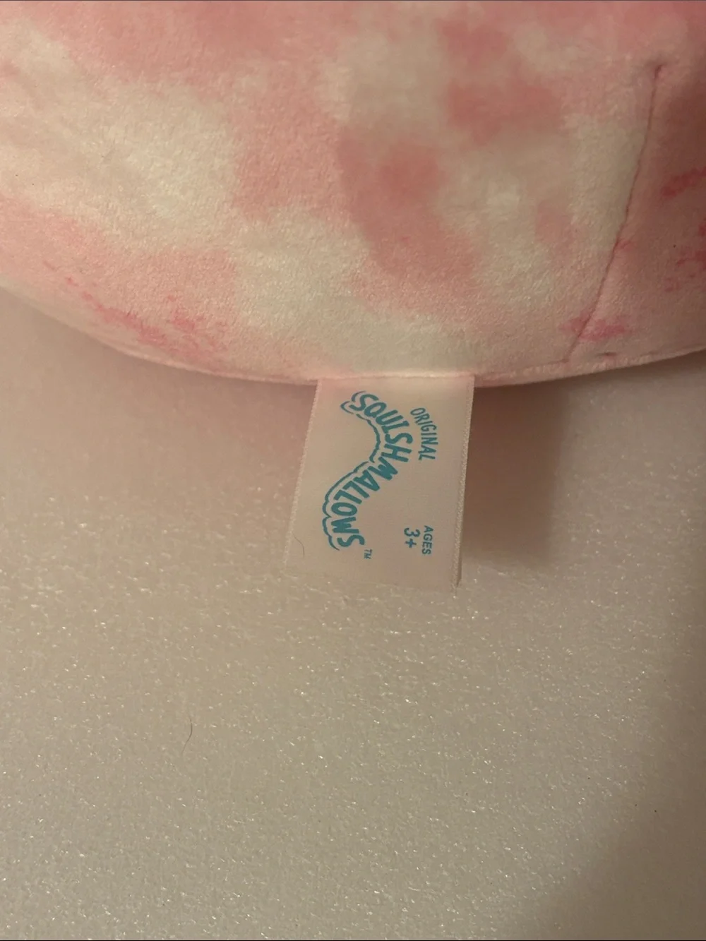 Squishmallows Pink Tie-Dye Bird with Yellow Flower Accent